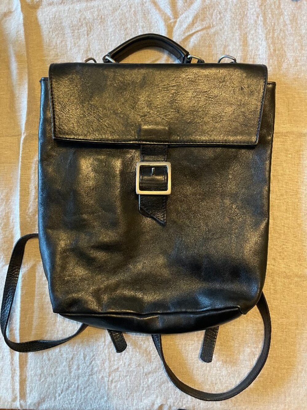 vintage black leather backpack